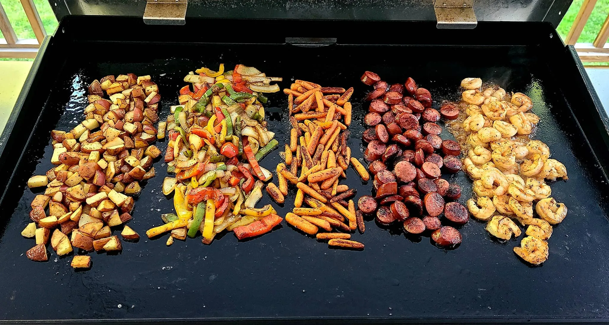 Blackstone 36 in griddle with food cooking
