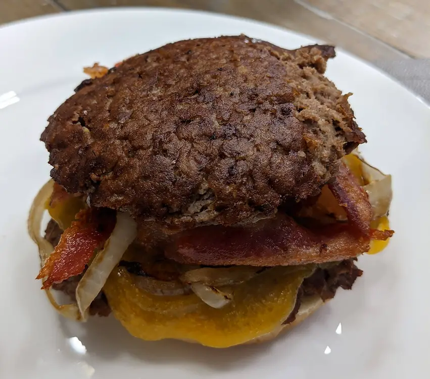 Smash burger cooked on a Blackstone griddle