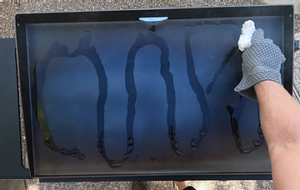 Rubbing Oil On A Blackstone griddle