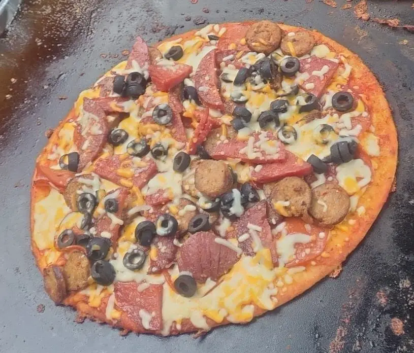 Pizza on a Blackstone Griddle - Griddle Sizzle