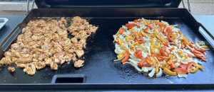 Traeger Flatrock Griddle cooking fajitas